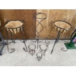 AN ASSORTMENT OF WROUGHT IRON GARDEN ITEMS TO IJNCLUDE PLANT STANDS AND A PAIR OF BASKET PLANTERS