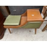 A CHIPPY HEATH FURNITURE RETRO TEAK AND FAUX LEATHER TELEPHONE TABLE/SEAT