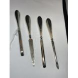 FOUR HALLMARKED BIRMINGHAM SILVER HANDLED MANICURE ITEMS