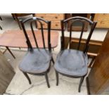 A PAIR OF BENTWOOD DINING CHAIRS