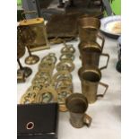 A QUANTITY OF BRASSWARE INCLUDING HORSE BRASSES, CROCODILE NUTCRACKERS, CARRIAGE CLOCK, ETC