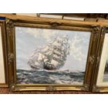 A LARGE ORNATE EMBOSSED GILT FRAMED PRINT OF TWO CLIPPER SHIPS IN ROUGH SEAS BY MONTAGUE DAWSON W: