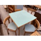 A 1950'S FORMICA TOP DRAW-LEAF KITCHEN TABLE AND FOUR CHAIRS