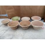 SEVEN LARGE MATCHING TERRACOTTA BOWL PLANTERS