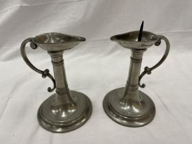 A PAIR OF MARKED 'A E WILLIAMS AND THOMAS E WILLIAMS' PEWTER CANDLESTICKS