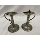 A PAIR OF MARKED 'A E WILLIAMS AND THOMAS E WILLIAMS' PEWTER CANDLESTICKS