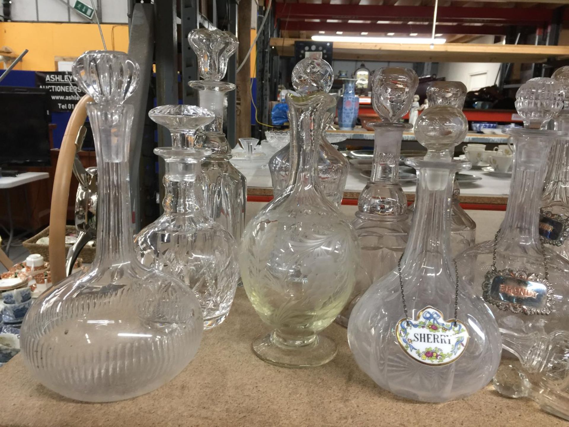 A QUANTITY OF GLASSWARE INCLUDING MAINLY DECANTERS, SOME WITH NAME TAGS PLUS A SCENT BOTTLE, BISCUIT - Image 2 of 6