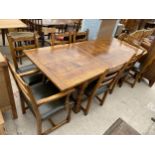A GEORGE III STYLE LIGHT OAK EXTENDING REFECTORY TABLE ON TURNED LEGS, 72X39" (TWO LEAVES 19.5"