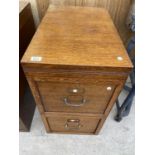 A VINTAGE WOODEN TWO DRAWER INTERLOCKING FILING CABINET