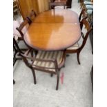 A MODERN MAHOGANY AND CROSSBANDED REGENCY STYLE PEDESTAL DINING TABLE AND SIX CHAIRS, TWO BEING