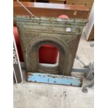 A VINTAGE CAST IRON FIRE PLACE WITH MANTLE PIECE