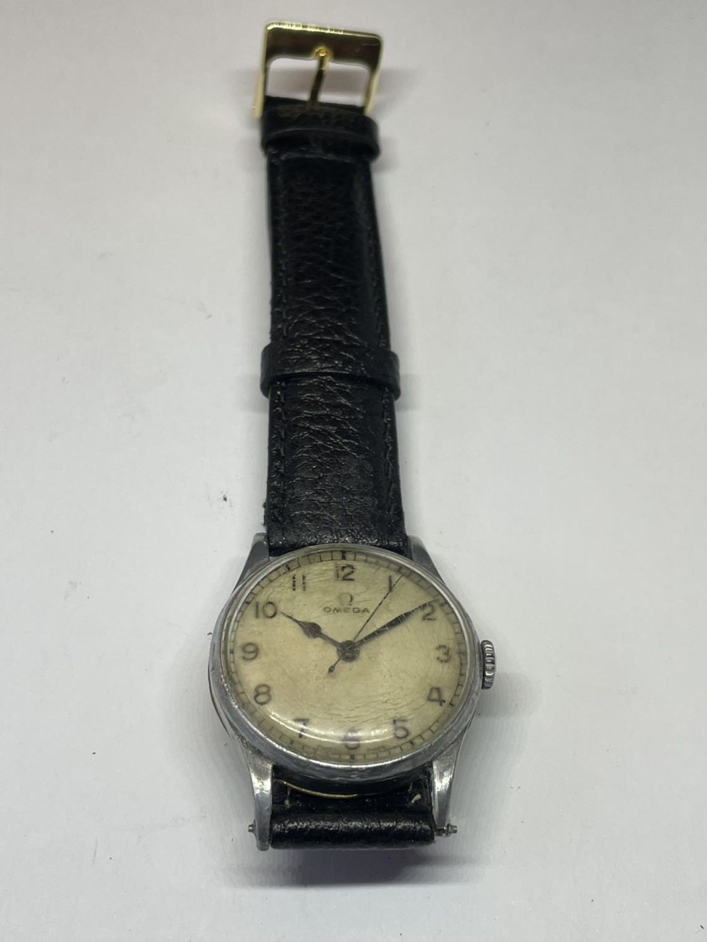 AN OMEGA WRIST WATCH FOR SPARES OR REPAIRS