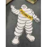 A CAST MICHELIN MAN SIGN 33CM