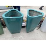 A PAIR OF GREEN FIBRE GLASS PLANTERS (H:72CM)