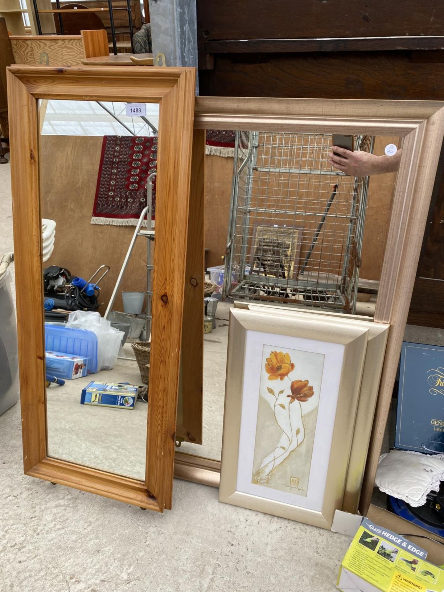 AN ASSORTMENT OF FRAMED PRINTS AND MIRRORS