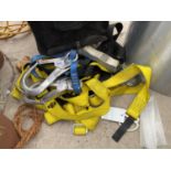 AN ASSORTMENT OF CLIMBING CLIPS AND HARNESSES ETC