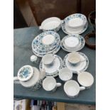 A MIDWINTER PART DINNER SERVICE TO INCLUDE TEAPOT, TRIOS AND SANDWICH PLATES ETC