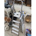 A FOUR RUNG ALUMINIUM STEP LADDER AND A FURTHER TWO RUNG ALUMINIUM STEP LADDER