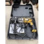 AN ELECTRIC DEWALT SDS DRILL