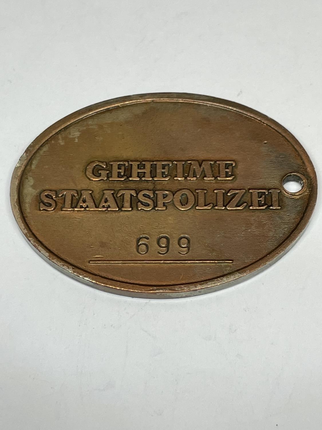 A GERMAN STYLE TAG GEHEIME STAATSPOLIZEI 699 - Image 2 of 2