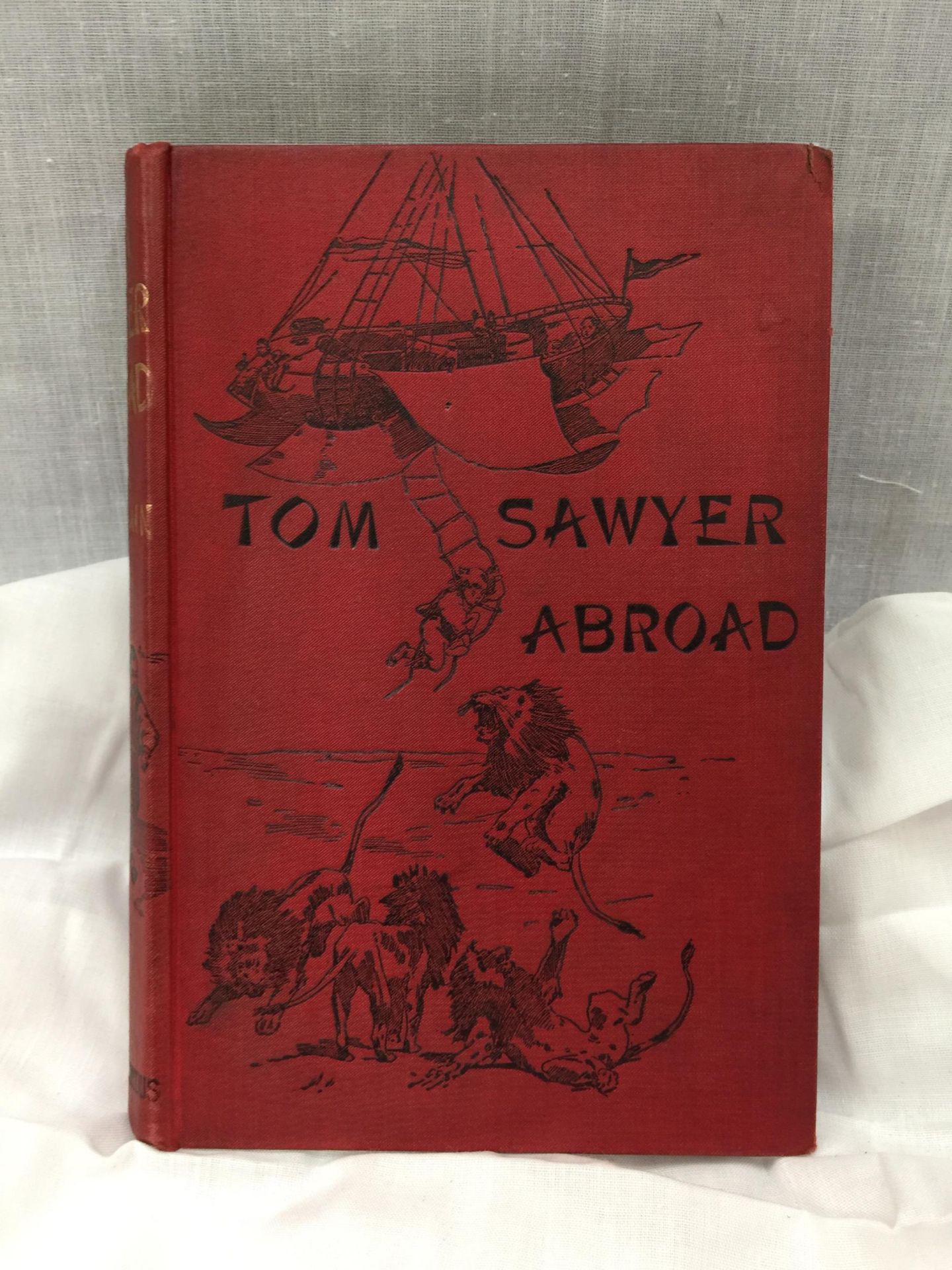 A FIRST EDITION TOM SAWYER ABROAD HARDBACK BY MARK TWAIN - PUBLISHED 1894 BY CHATTO & WINDUS