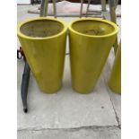 A PAIR OF ROUND YELLOW FIBRE GLASS PLANTERS (H:72CM)