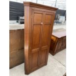 A 19TH CENTURY MAHOGANY FULL LENGTH FOUR DOOR CORNER CUPBOARD WITH SHAPED INTERIOR SHELVES, 40" WIDE