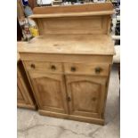 A VICTORIAN PINE CHIFFONIER WITH RAISED BACK, TWO DRAWERS AND TWO CUPBOARDS, 37" WIDE