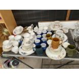 AN ASSORTMENT OF CERAMIC WARE TO INCLUDE JUGS, DENBY CUPS, PLATES AND SAUCERS ETC