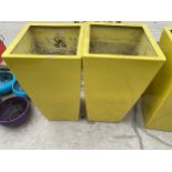 A PAIR OF YELLOW FIBRE GLASS PLANTERS (H:73CM)