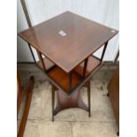 AN EDWARDIAN MAHOGANY AND INLAID REVOLVING BOOKCASE, 15" SQUARE, ON TAPERING LEGS