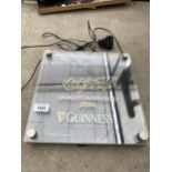 AN ILLUMINATED GUINNESS SIGN BELIEVED WORKING BUT NO WARRANTY