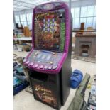 AN INDIANA JONES FRUIT MACHINE WITH KEYS AND BELIEVED IN WORKING ORDER BUT NO WARRANTY