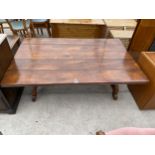 A LARGE HARDWOOD COFFEE TABLE, 58X38", WITH CAST METAL SUPPORT