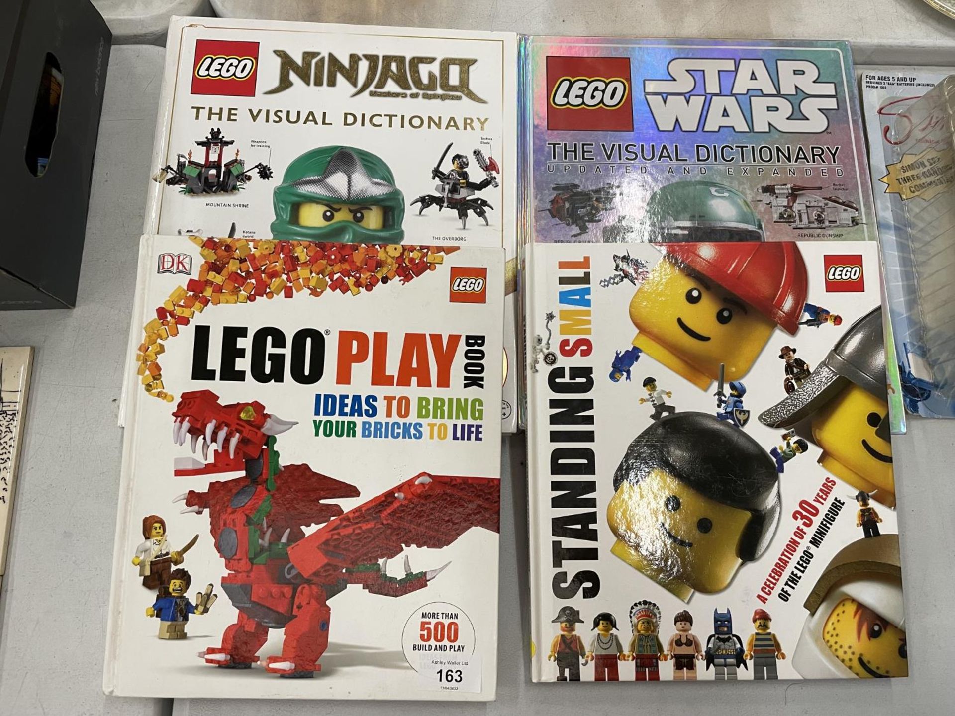 A QUANTITY (4) OF LEGO BOOKS - TWO WITH FIGURES - INCLUDING STAR WARS 'THE VISUAL DICTIONARY, '