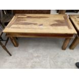 A MODERN HARDWOOD COFFEE TABLE, 43.5X24"