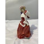 A ROYAL DOULTON FIGURE 'CHRISTMAS MORN' HN1992