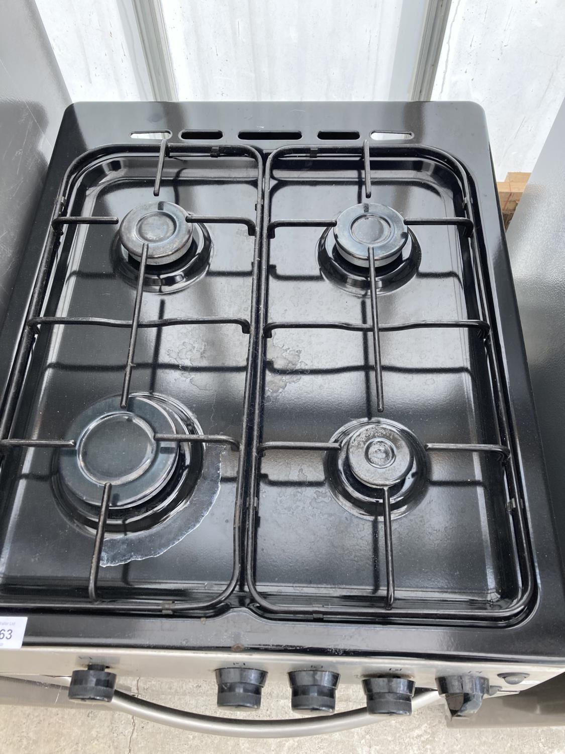A SILVER AND BLACK ELECTRIC AND GAS OVEN AND HOB - Image 2 of 3
