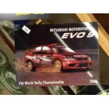 A MITSUBISHI MOTORSPORT EVO METAL SIGN 40CM X 30CM