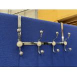 A CHROME AND ENAMEL HORTON & CO OF LONDON COAT RACK