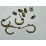 FOUR YELLOW METAL POSSIBLY GOLD EARRING WITH VARIOUS BACKS INA PRESENTATION BOX