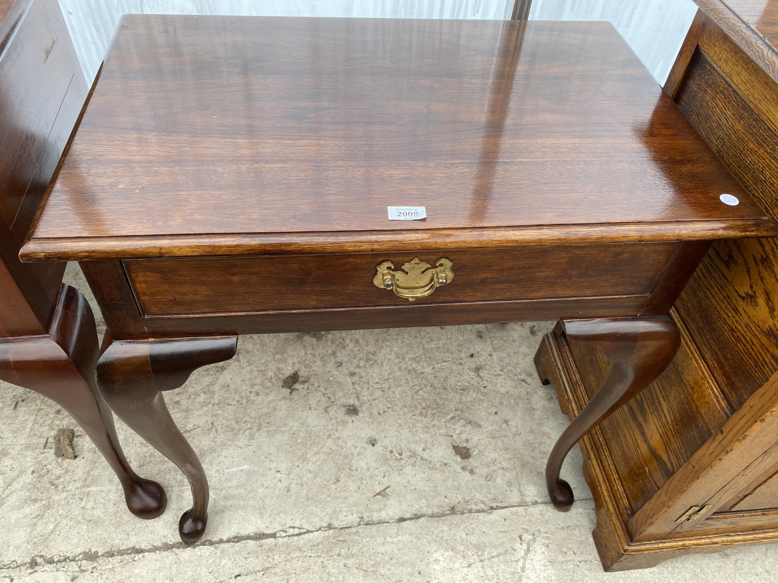 A GEORGIAN STYLE MAHOGANY SIDE-TABLE WITH SINGLE DRAWER, ON CABRIOLE LEGS, 29.5" WIDE