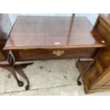 A GEORGIAN STYLE MAHOGANY SIDE-TABLE WITH SINGLE DRAWER, ON CABRIOLE LEGS, 29.5" WIDE