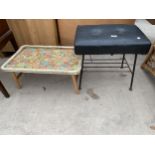 A FAUX LEATHER STOOL AND A TRAY WITH FOLDING LEGS