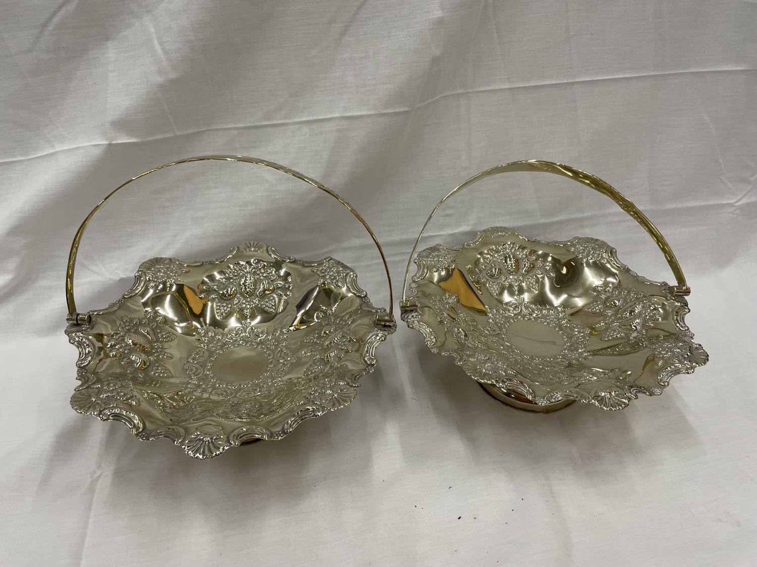 TWO MARKED POTTER SILVER PLATED ORNATE FRUIT BASKETS DIAMETER 28CM