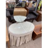 A 1950'S DRESSING TABLE WITH OVAL TABLE AND CURTAIN FRONT, 34" WIDE