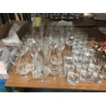 A MIXTURE OF WINE, CHAMPAGNE, MARTINI, TUMBLERS, ETC GLASSES