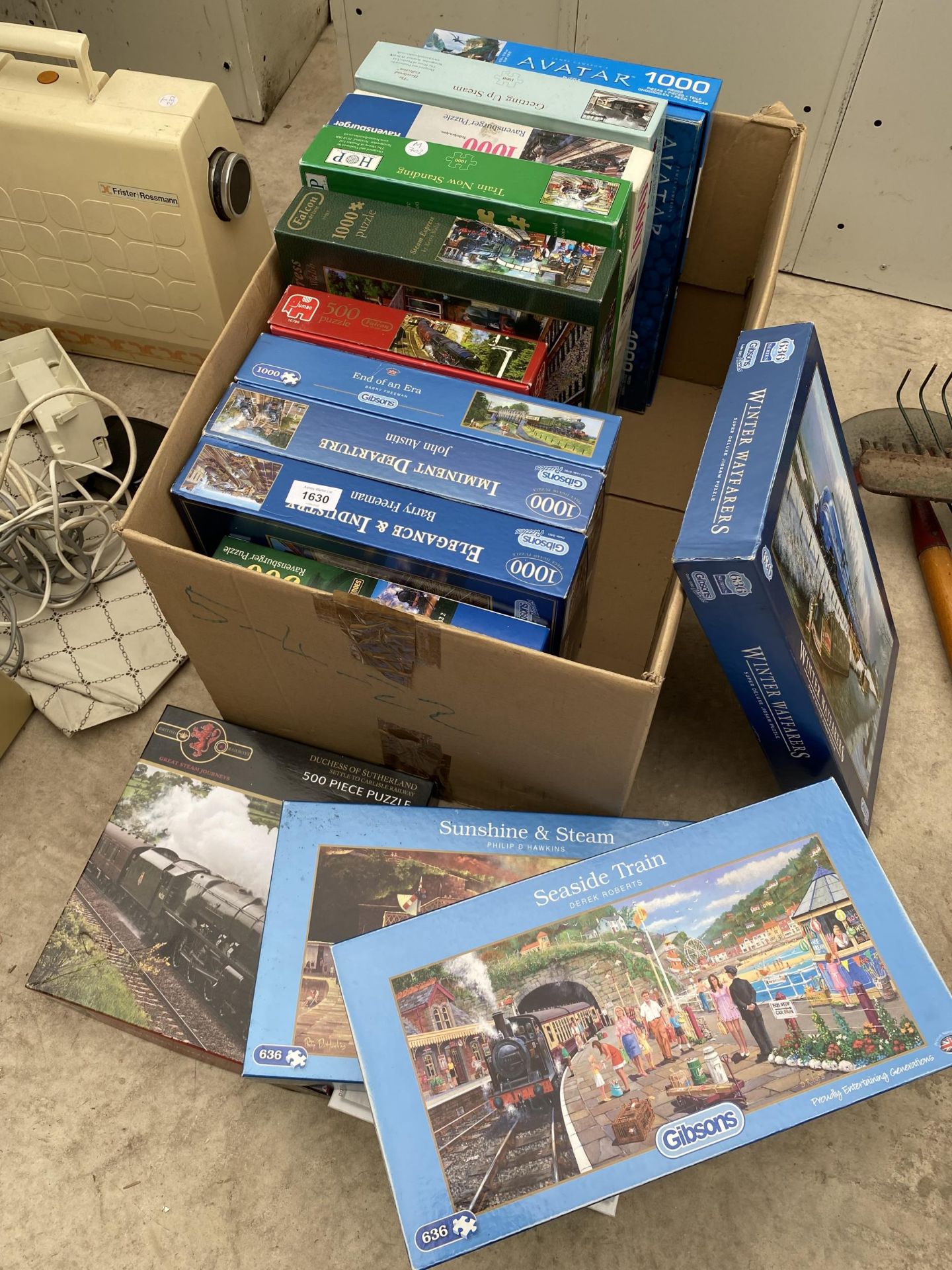 A LARGE QUANTITY OF JIGSAW PUZZLES