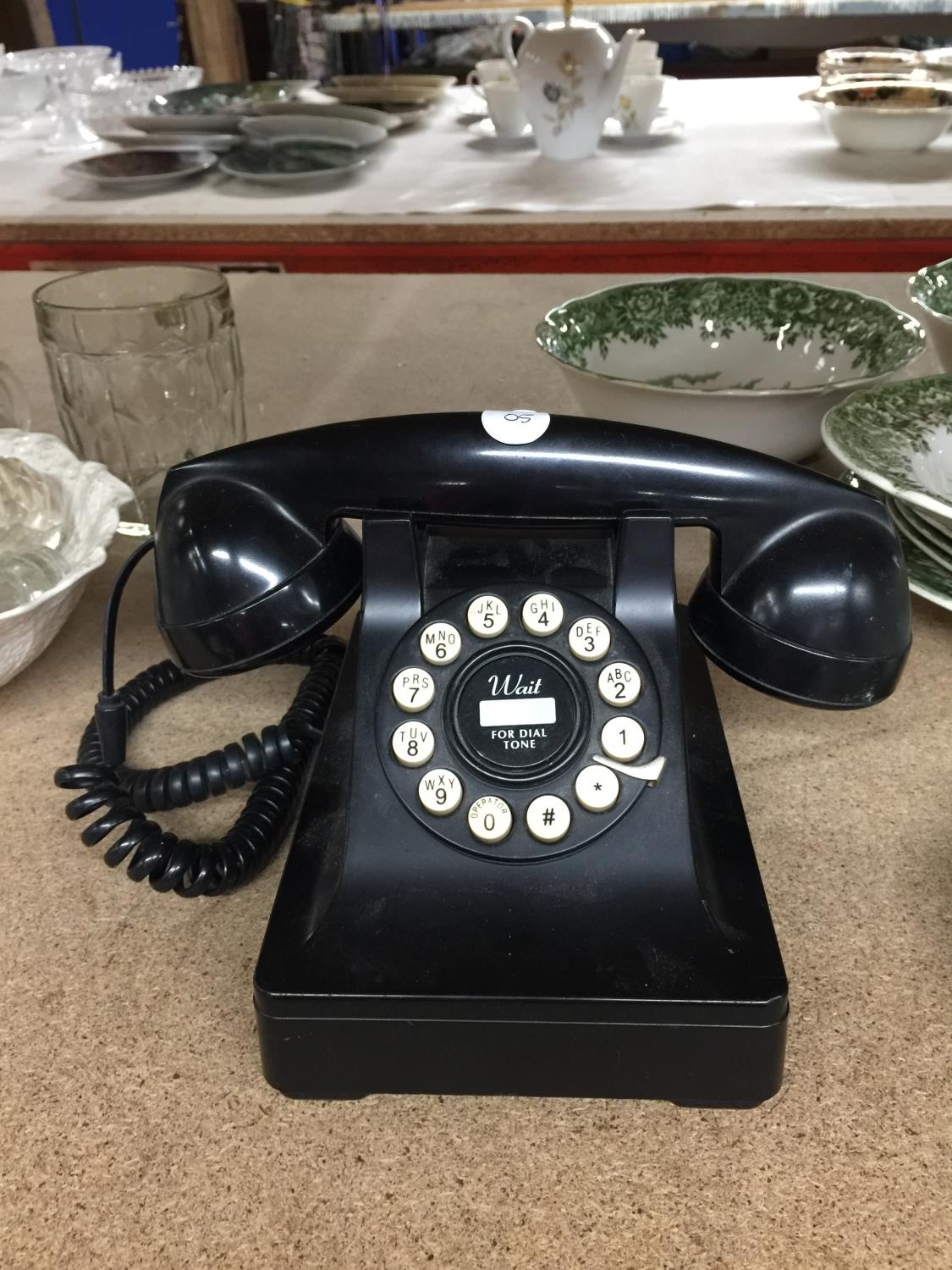 A VINTAGE STYLE BLACK PUSH BUTTON TELEPHONE
