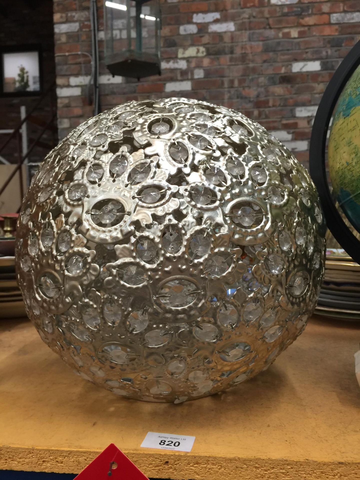 A WHITE METAL ROUND LAMPSHADE WITH CRYSTALS